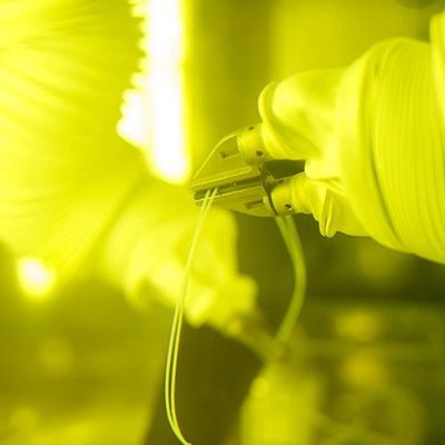 Robotic hands in radiochemistry facility